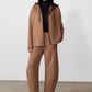 Mocha work scuba pants with elastic waist and relaxed ankle-length straight legs