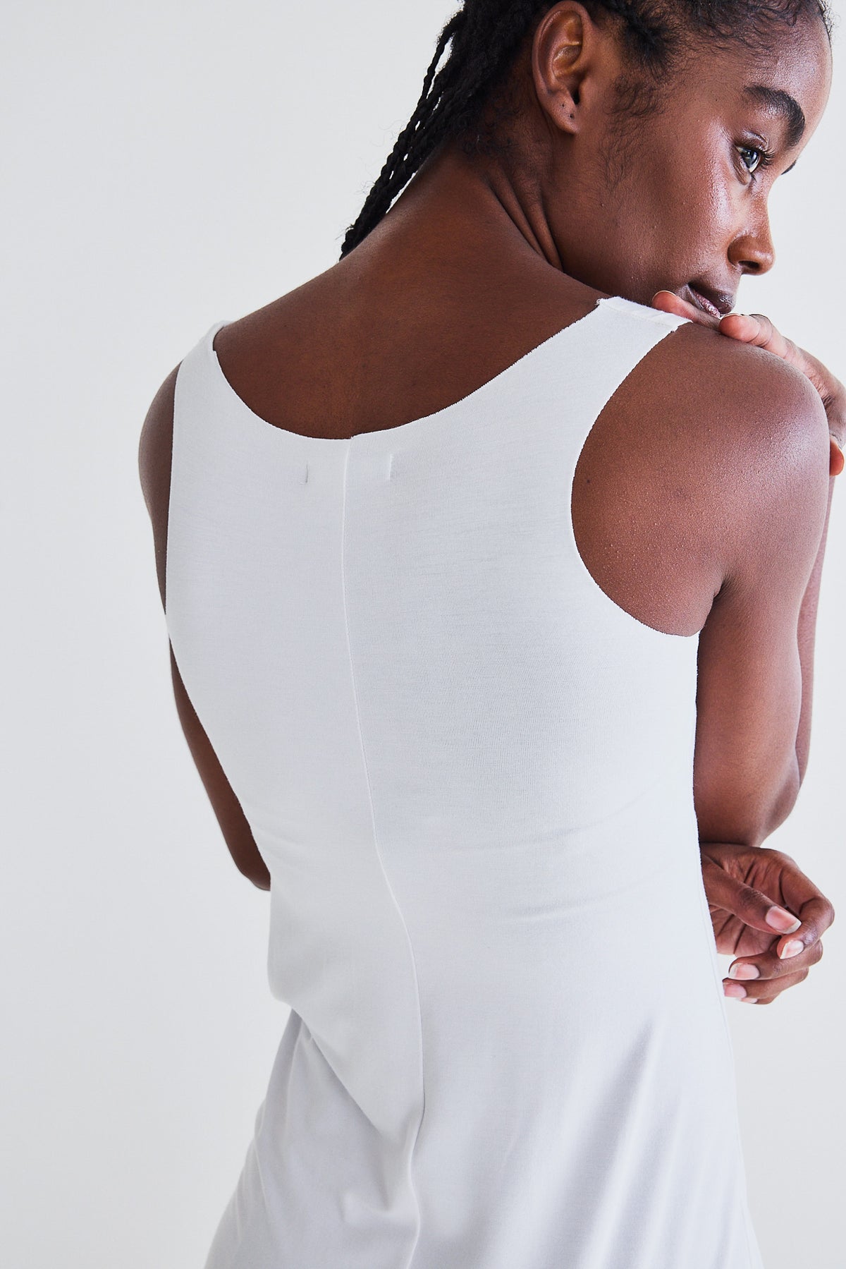 White long seamless cami back view with scoop neck and racerback straps