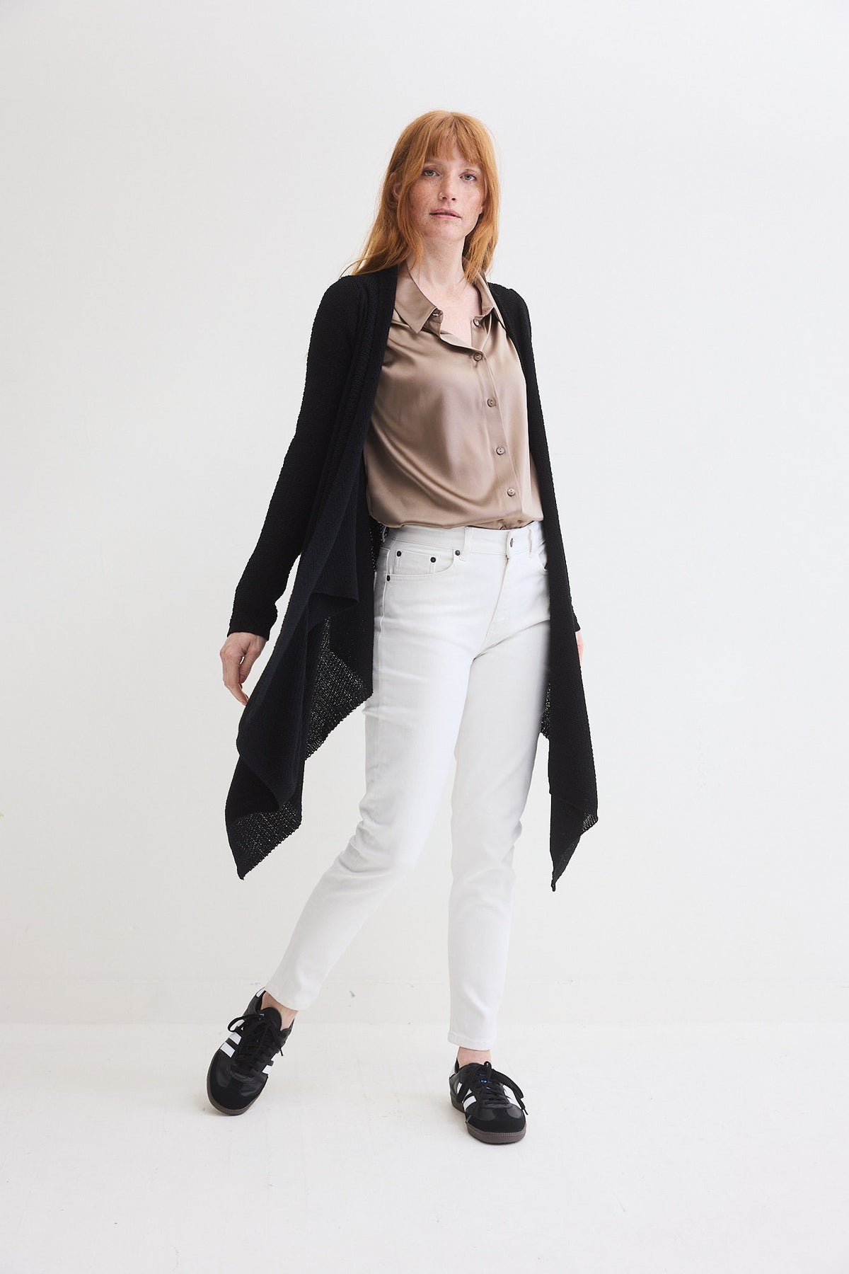 Black knit wrap cardigan with open drape front and long sleeves