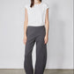 Storm gray work scuba pants on model, straight wide legs with pull-on waistband