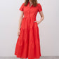 Hot coral long poplin dress with short sleeves, button front, and tiered skirt