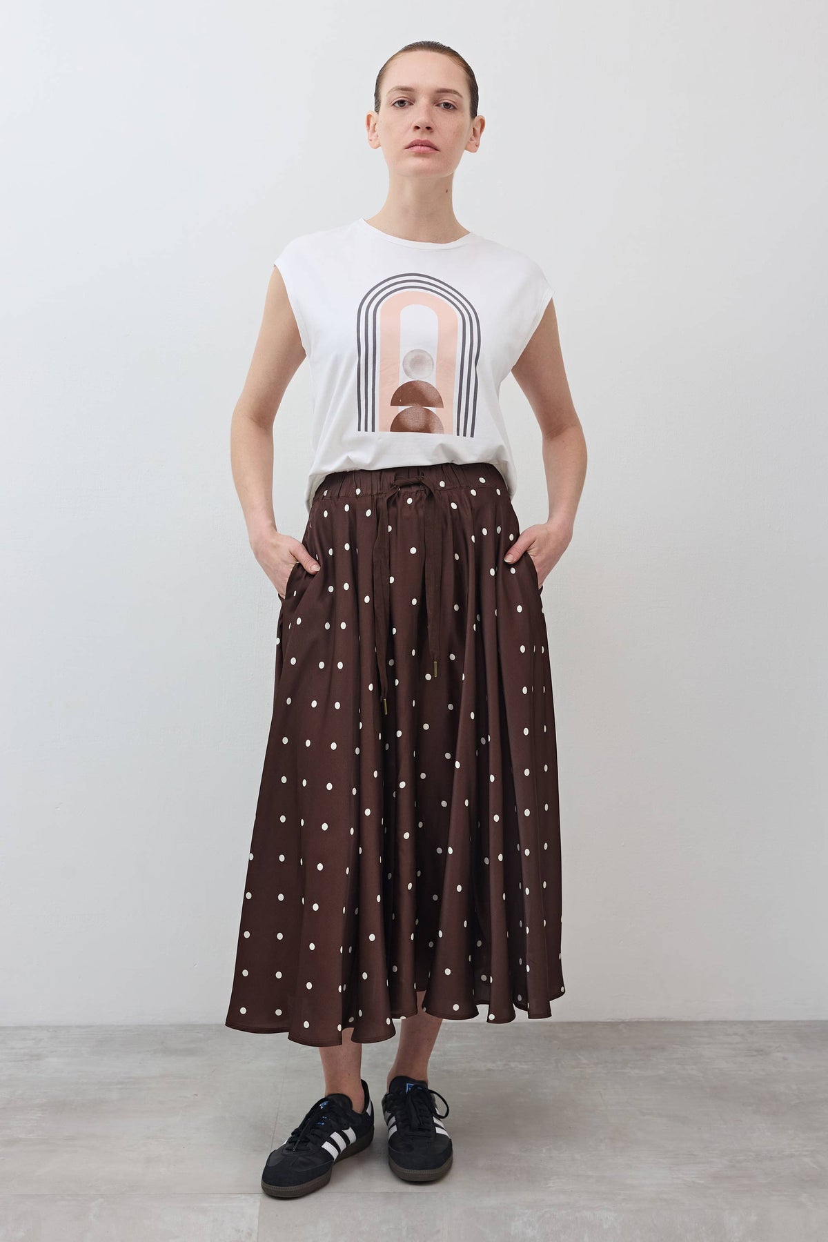 Brown maxi skirt with white polka dots, gathered pleats and elastic waistband