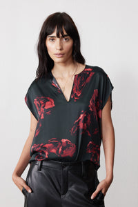Front view of rose-print silk top, V-neck, short sleeves, dark with red florals