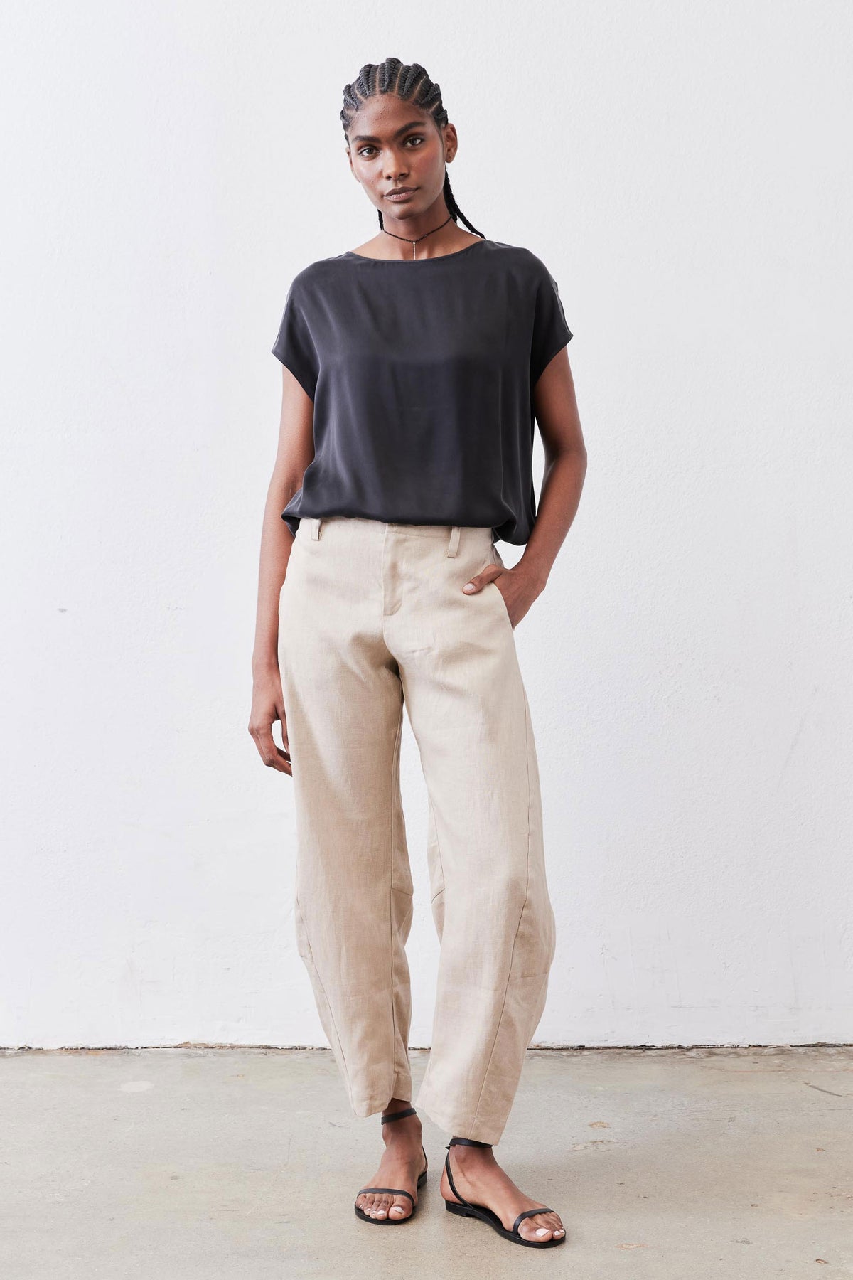 Black silk short-sleeve blouse with draped fit