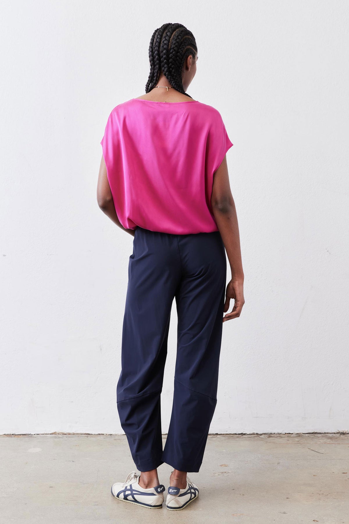 Fuchsia silk blouse, short sleeves, back view with crew neckline