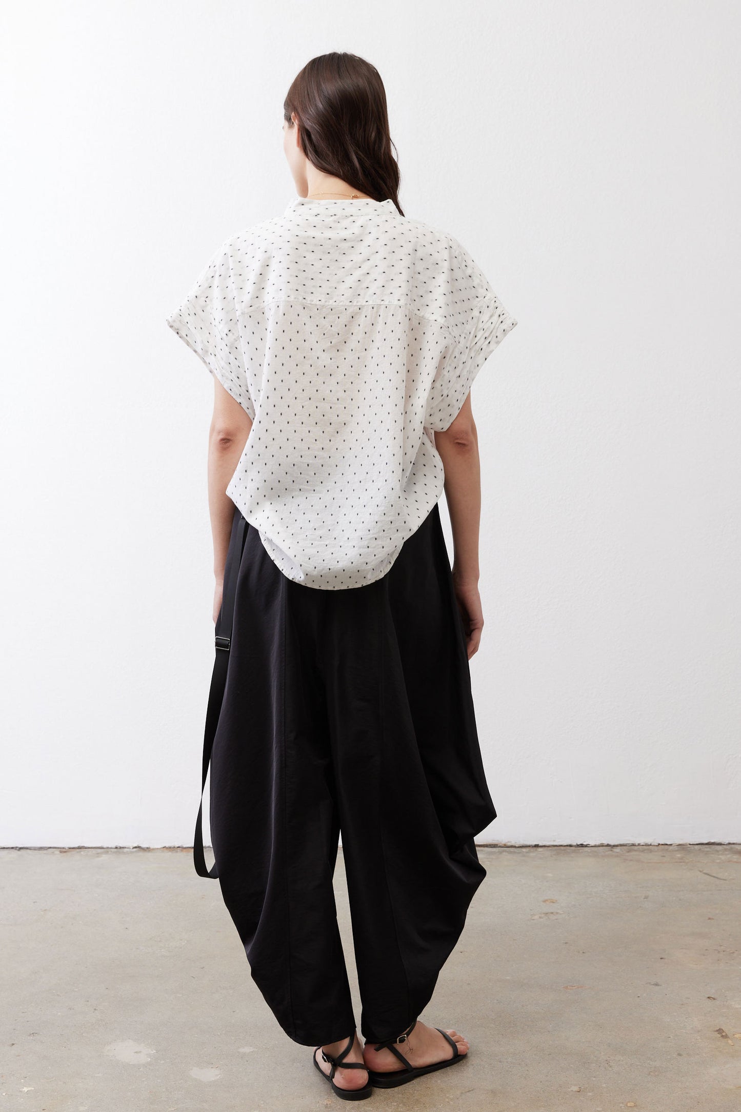 White dot-print blouse with short sleeves, back view