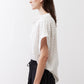White dot-print blouse with button-front and short sleeves