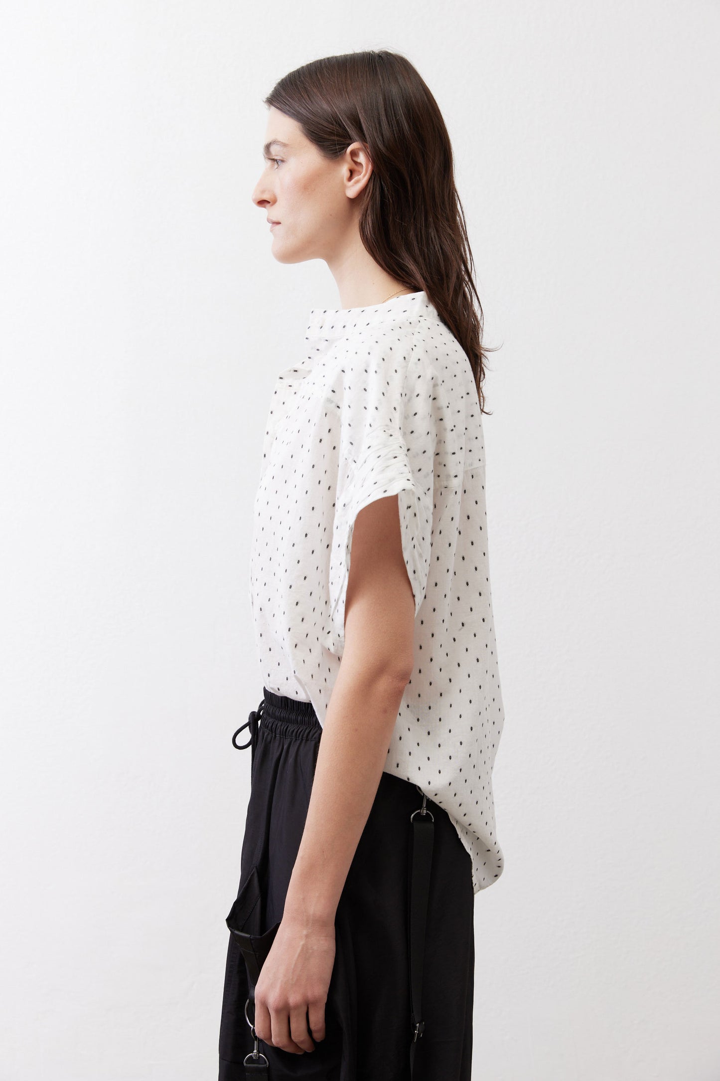 White dot-print blouse with button-front and short sleeves