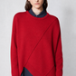 Red asymmetric pullover sweater with diagonal seam and ribbed crew neck