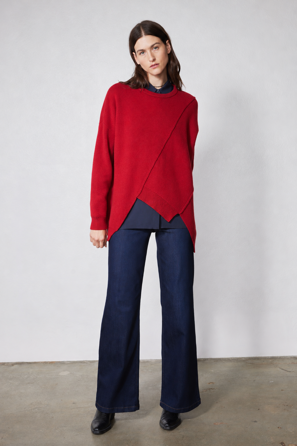 Red asymmetric pullover sweater, diagonal seam hem with ribbed neck and cuffs