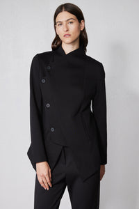 Black asymmetric scuba jacket with stand collar, snap buttons, and draped waist panel