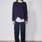 Asymmetric pullover sweater in deep purple, diagonal front seam and ribbed hem