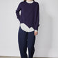 Asymmetric pullover sweater in deep purple with diagonal drape front and long sleeves