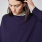 Asymmetric pullover sweater deep purple with diagonal seam, ribbed collar and cuff detail