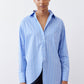 Front view of light blue striped button-down shirt with pointed collar