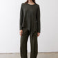 Asymmetric long-sleeve tunic in dark forest green with draped front hem