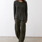 Asymmetric long-sleeve tunic in dark forest green with longer back hem