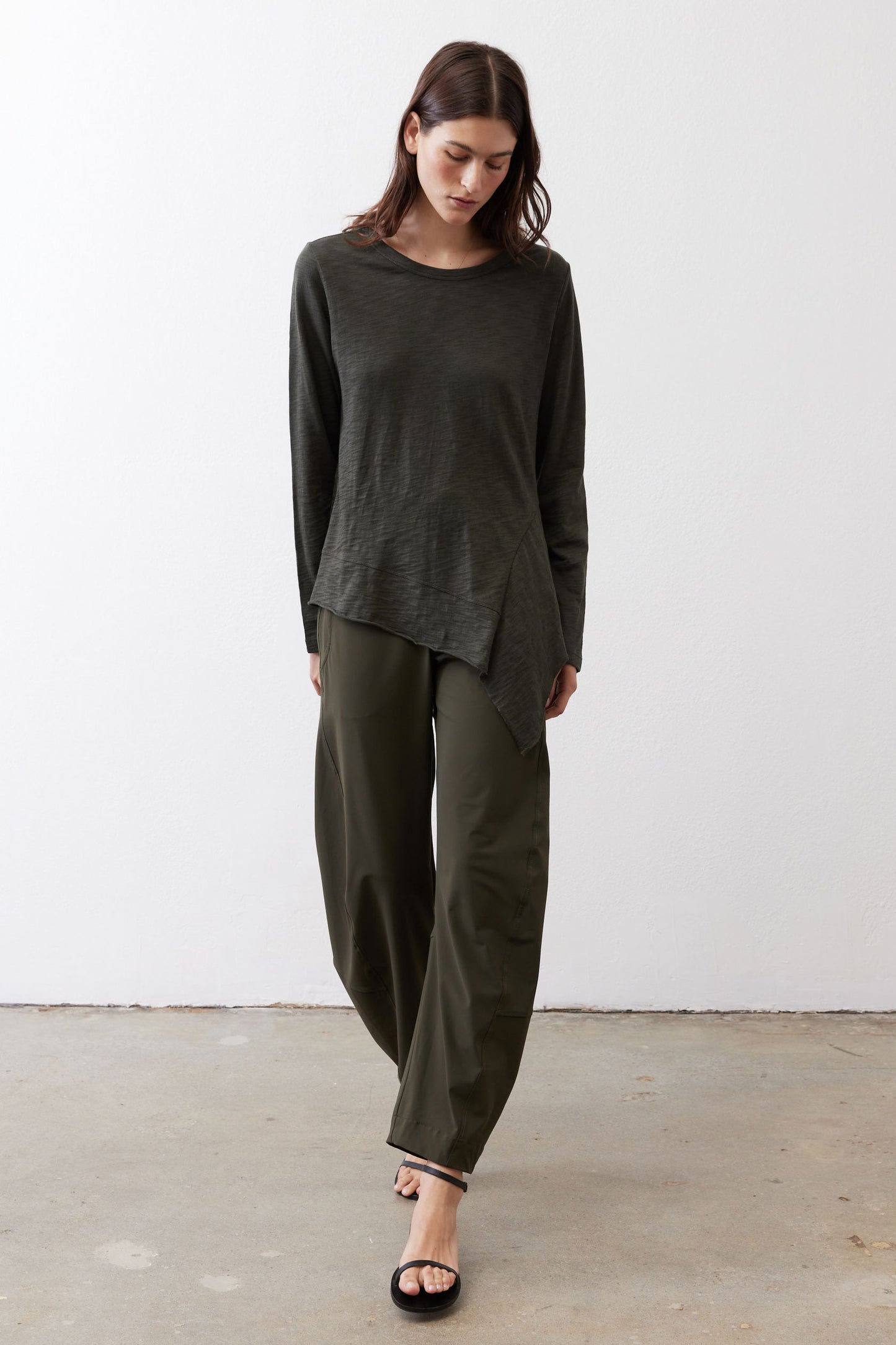Asymmetric long-sleeve tunic in dark forest green with longer back hem