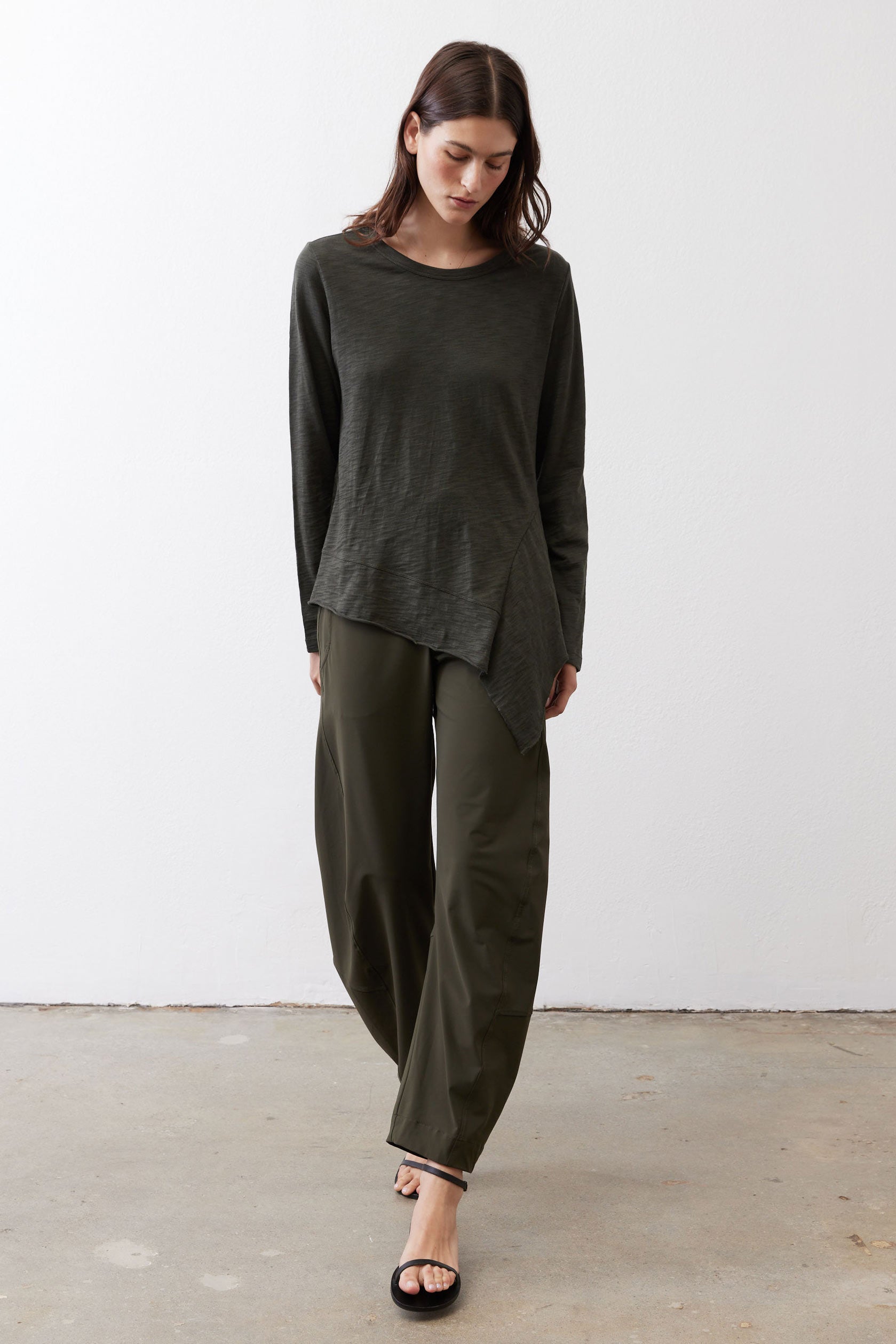 Asymmetric long-sleeve tunic in dark forest green with longer back hem