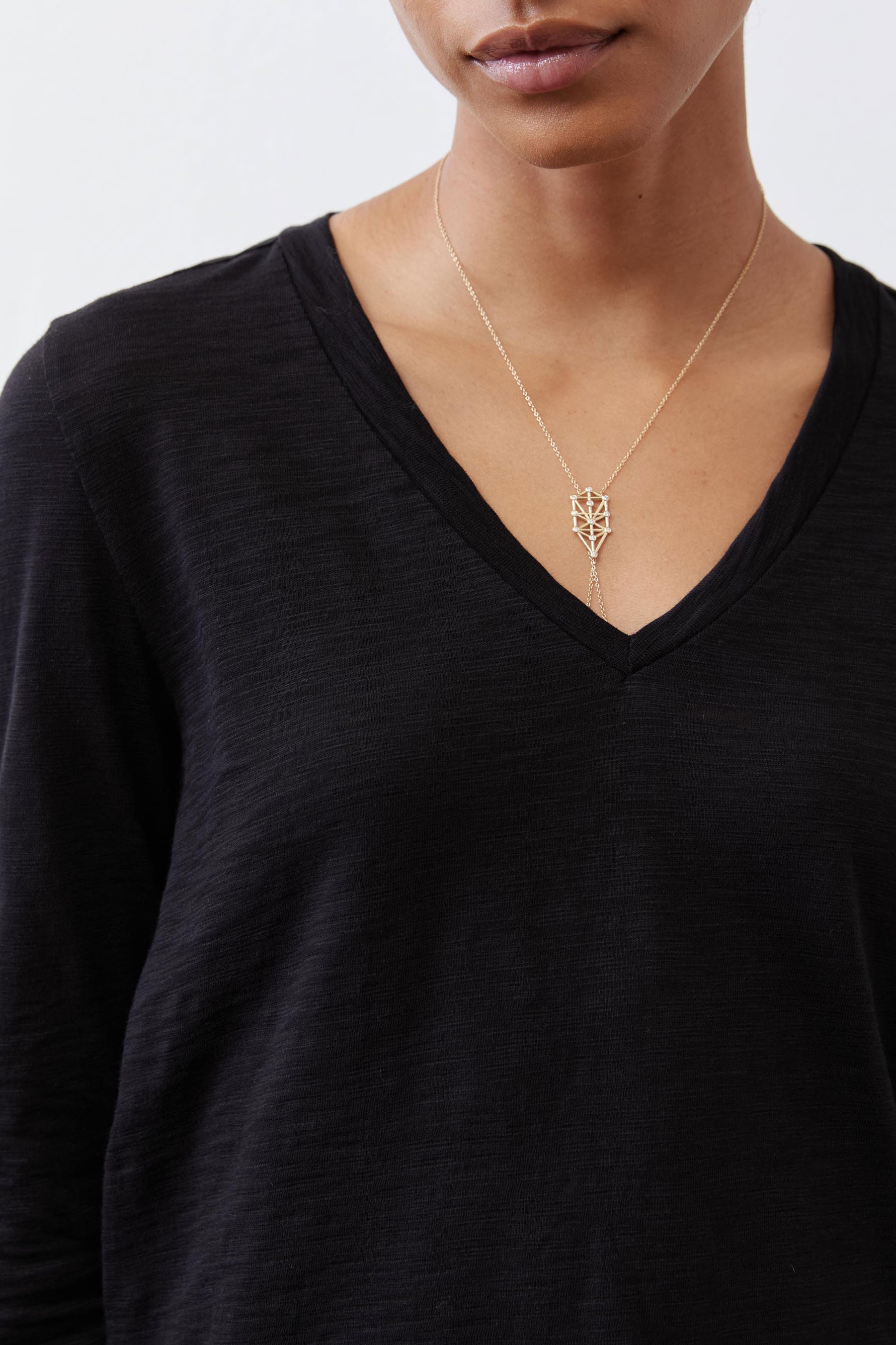 Black long-sleeve tunic with V-neck
