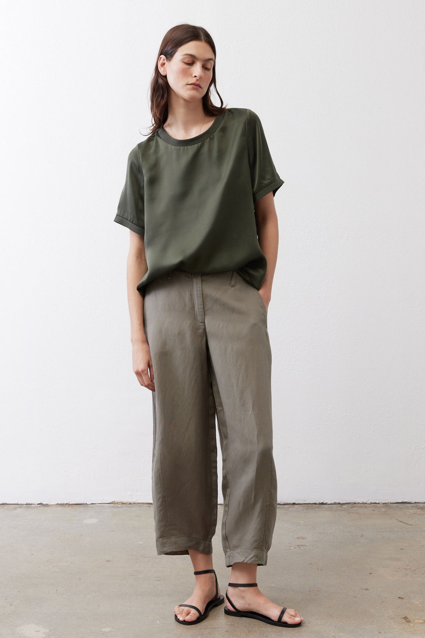 Olive petite wide-leg ankle pants with relaxed fit and cuffed hem