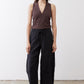 Black baggy utility pants with elastic drawstring waist and wide cropped legs