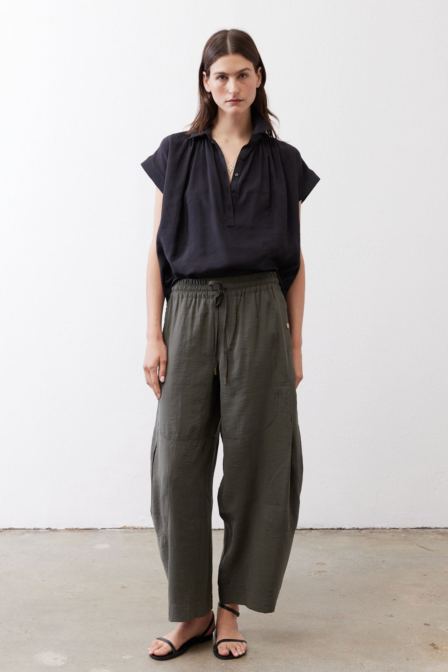 Utility pants, dark olive, elastic drawstring waist and wide cropped legs, front view