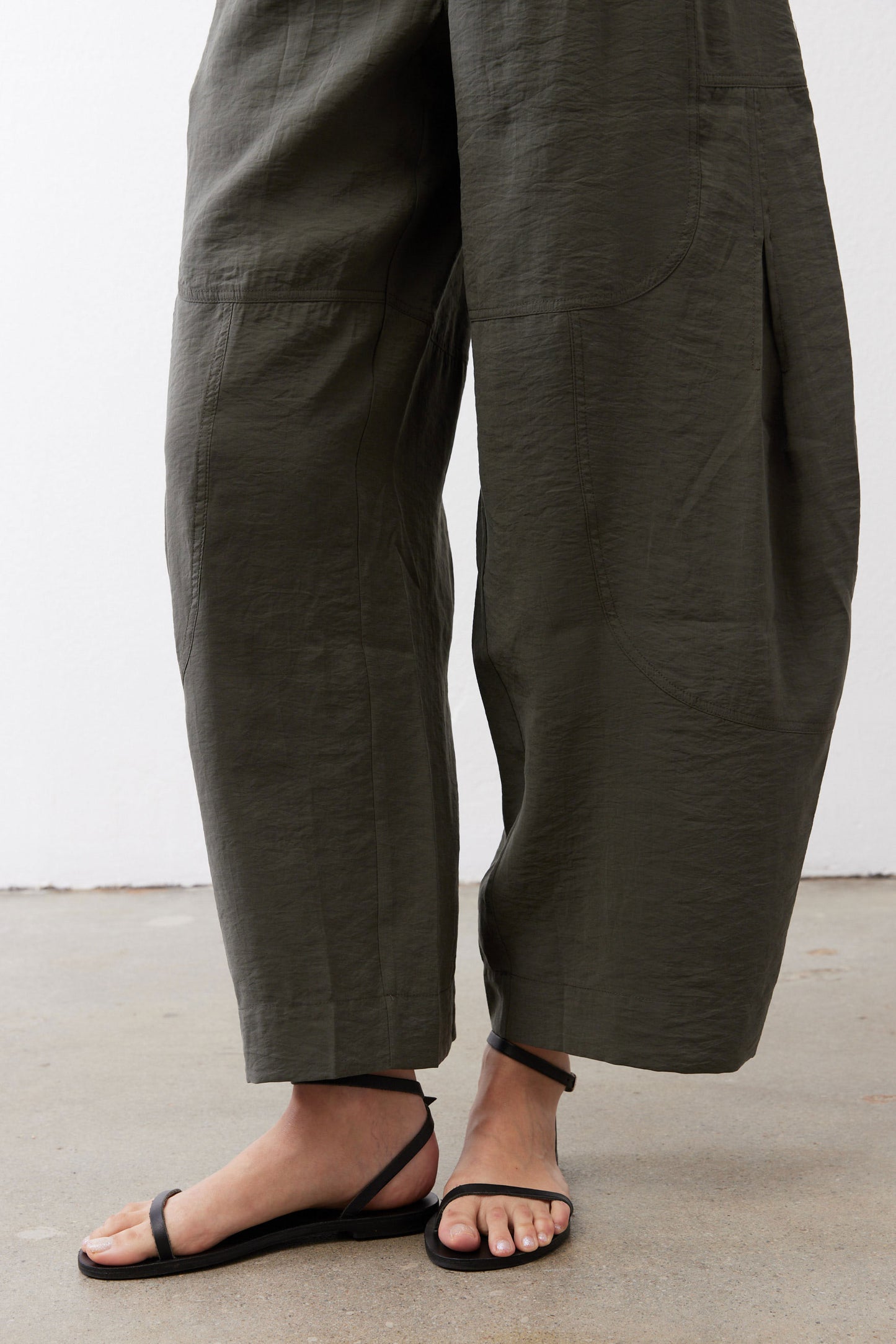 Wide-leg utility pants, dark olive, ankle-width cuffs and gathered elastic waist