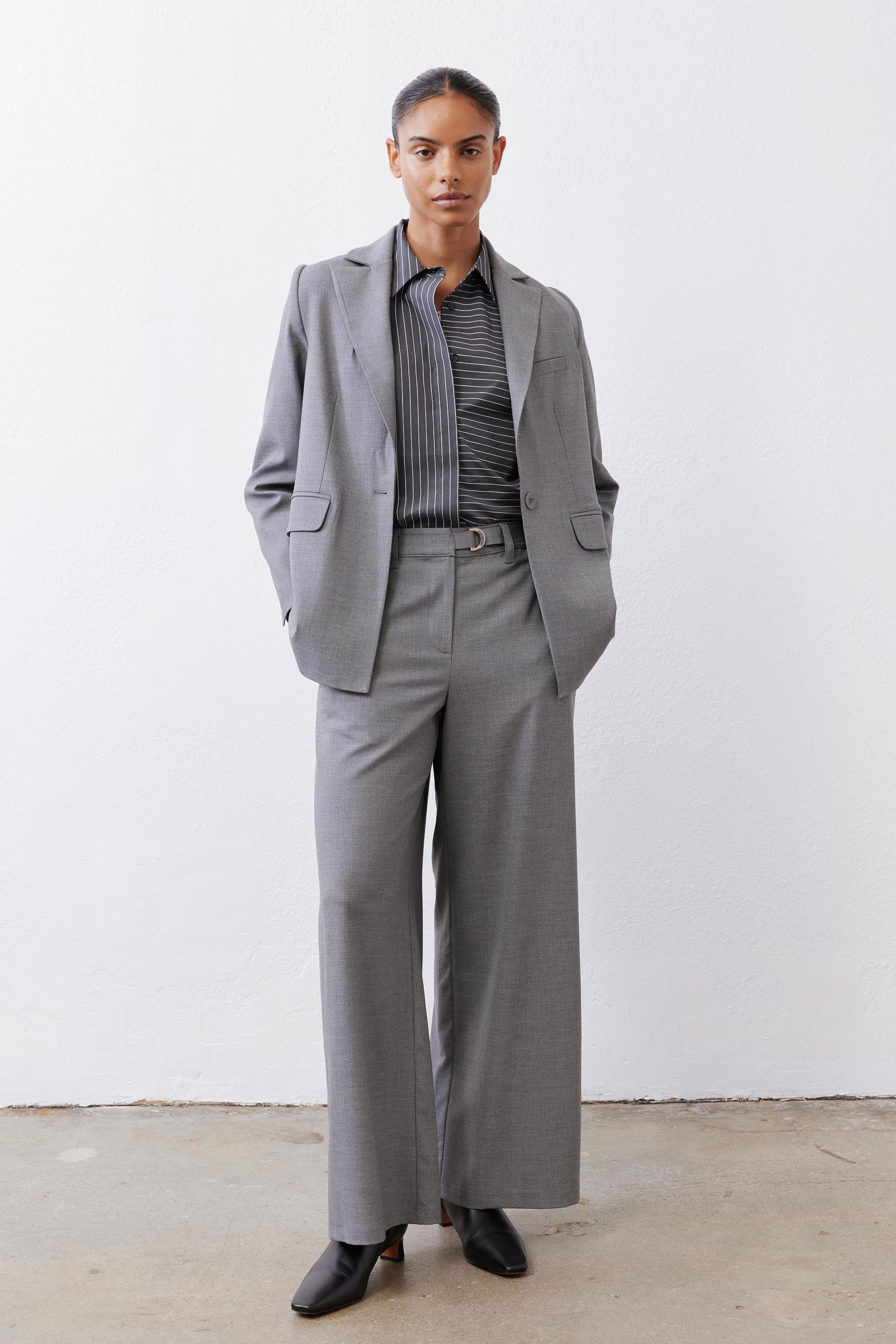 Pebble melange gray belted wide-leg trousers with front crease and side pockets