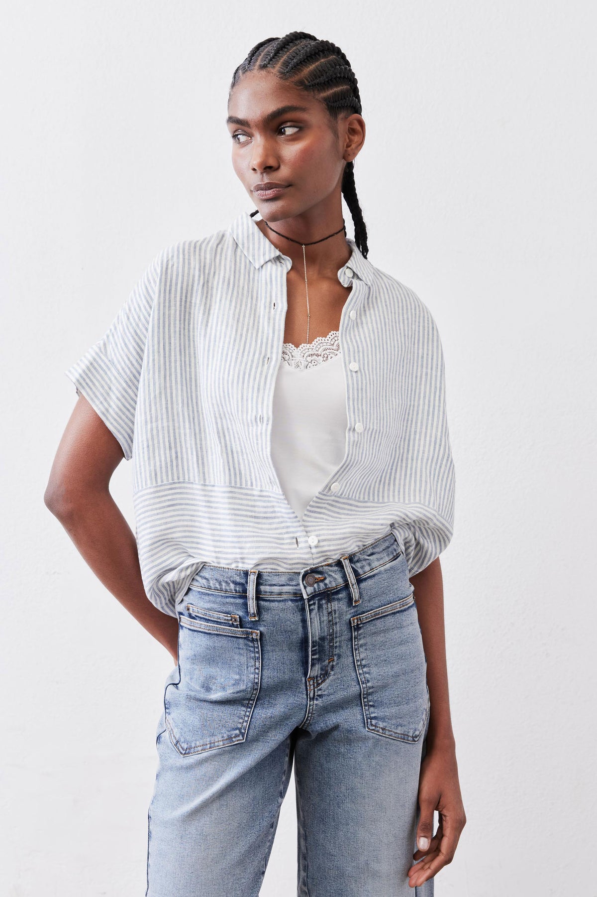 Boxy cropped linen blouse with blue pinstripes, button front, short sleeves