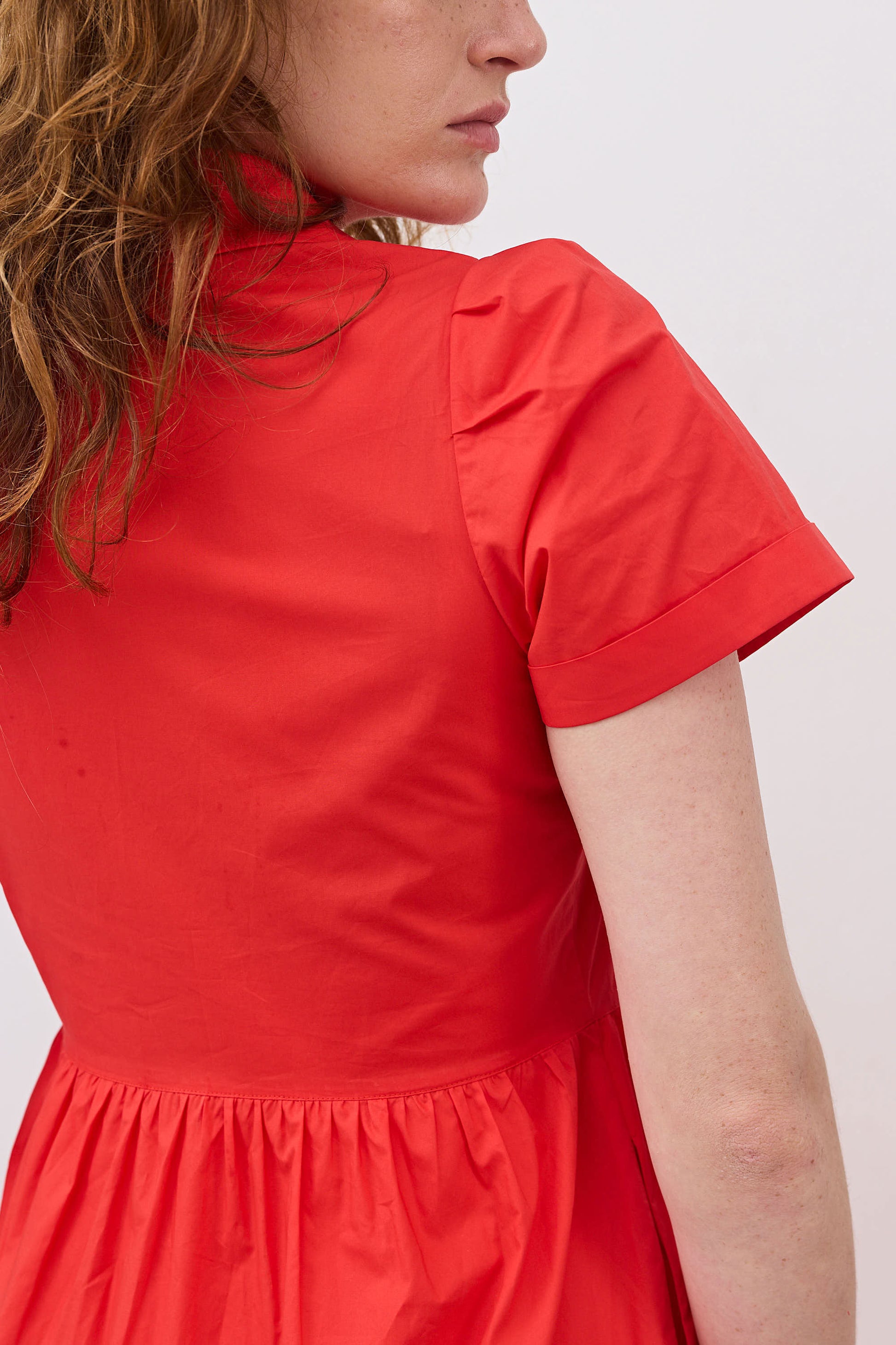 Hot coral poplin dress close-up of collar and short sleeve with tiered waist detail