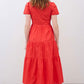 Hot coral long poplin dress back view with tiered skirt and short sleeves