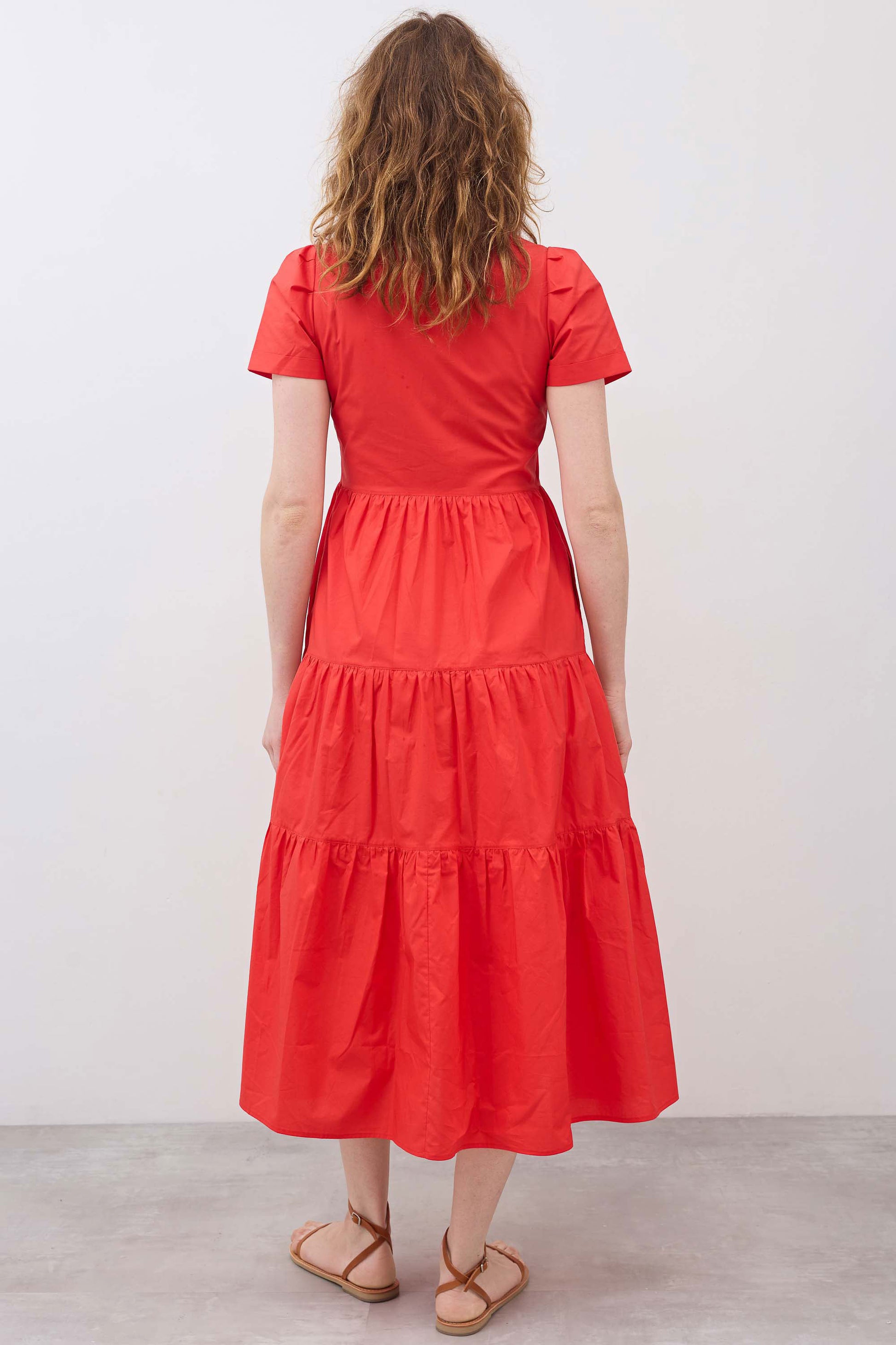 Hot coral long poplin dress back view with tiered skirt and short sleeves