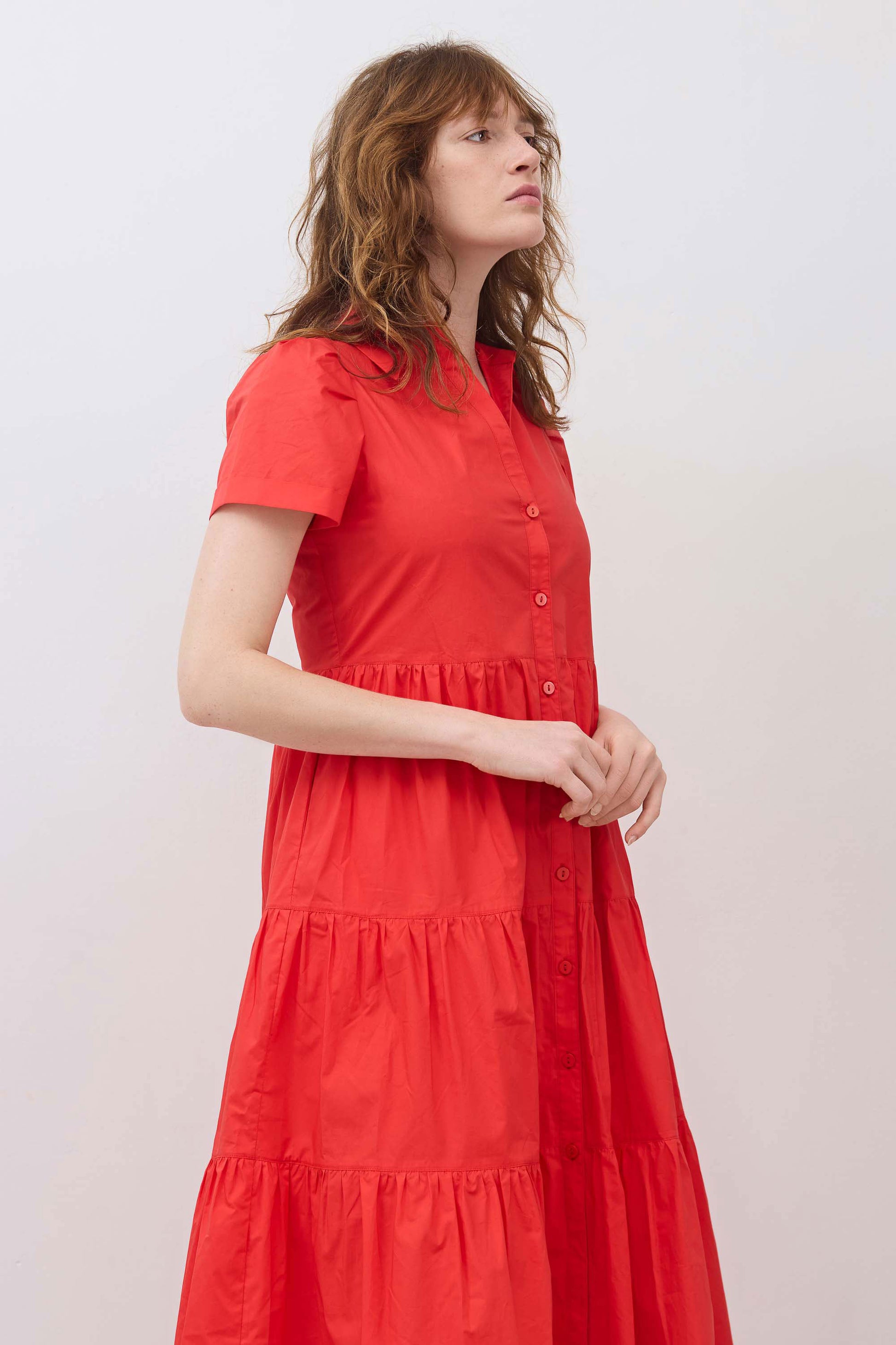 Hot coral poplin dress front view with short sleeves and tiered skirt