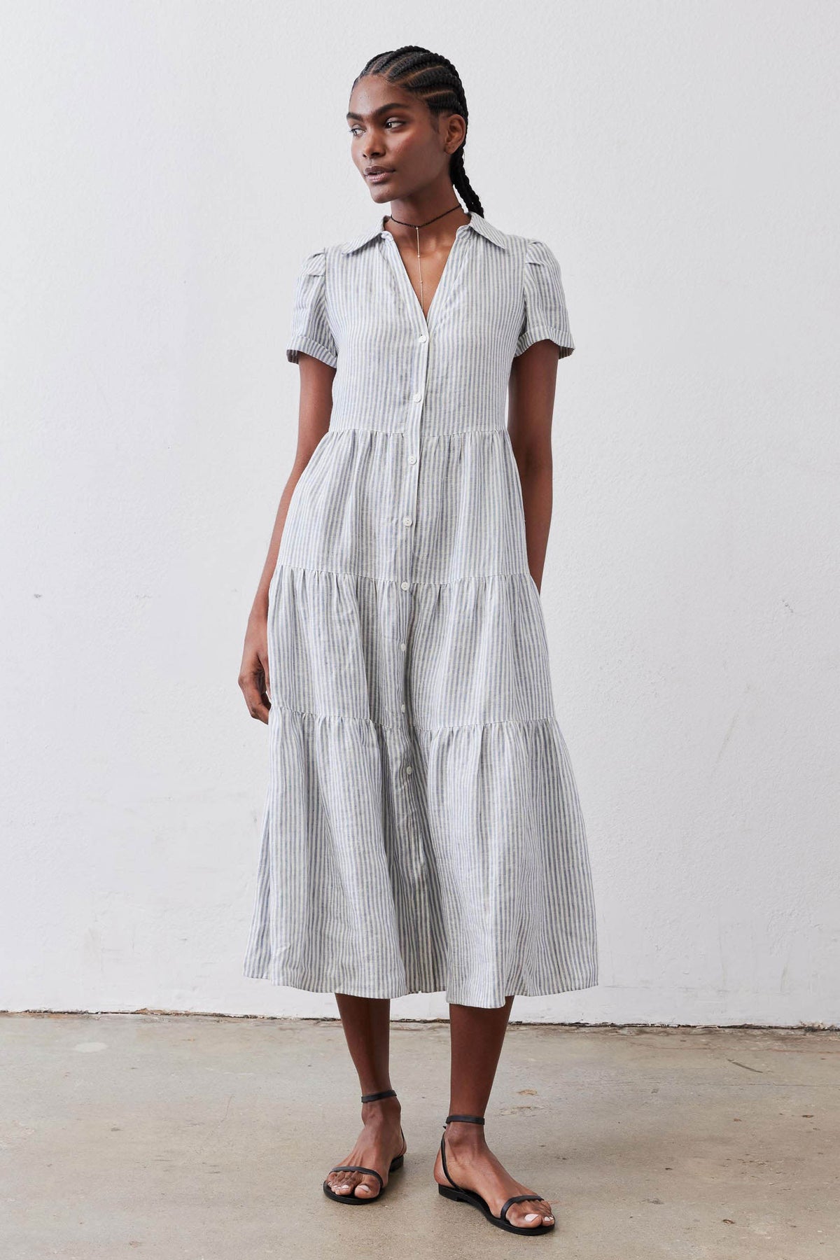 Long linen dress with white and blue pin stripes, collared button front, tiered skirt