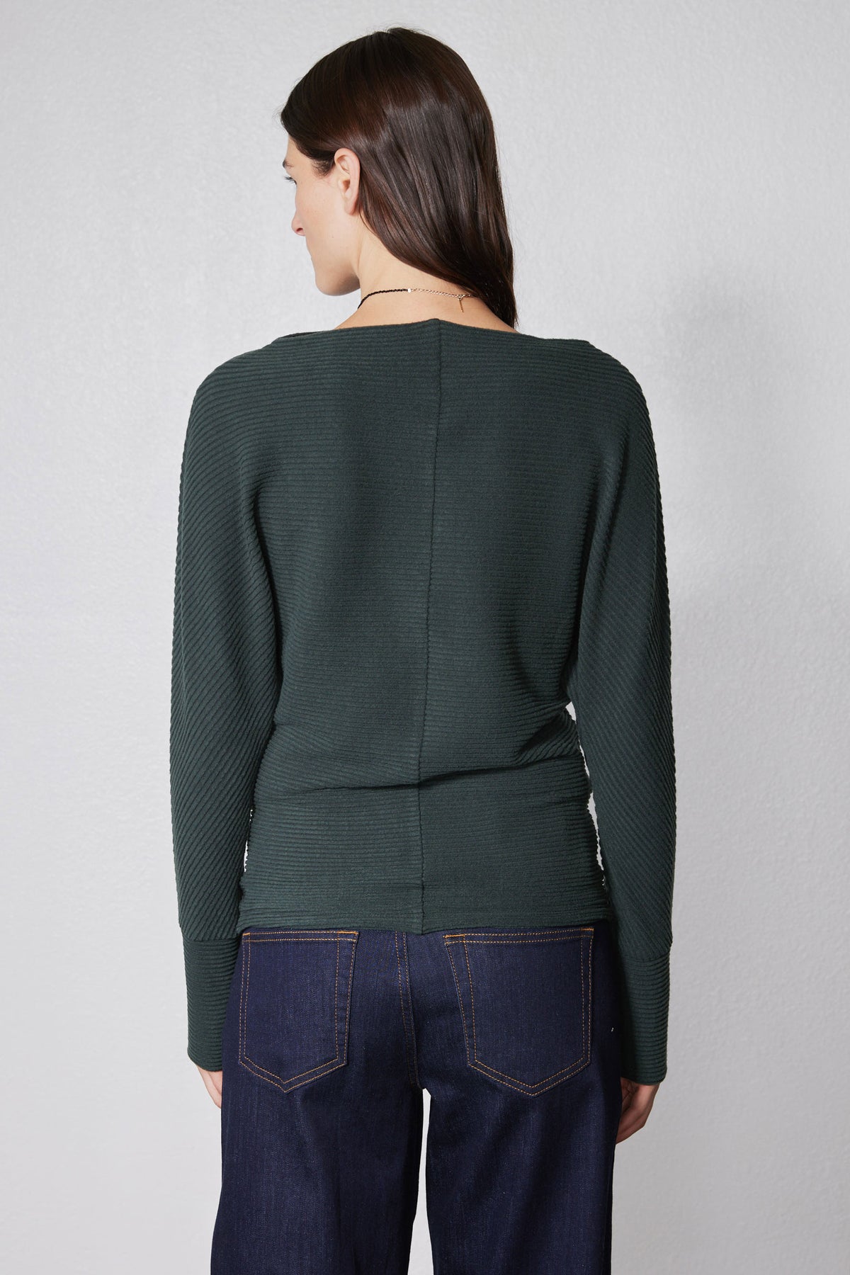 Brushed rib dolman top in dark green, back view with long sleeves