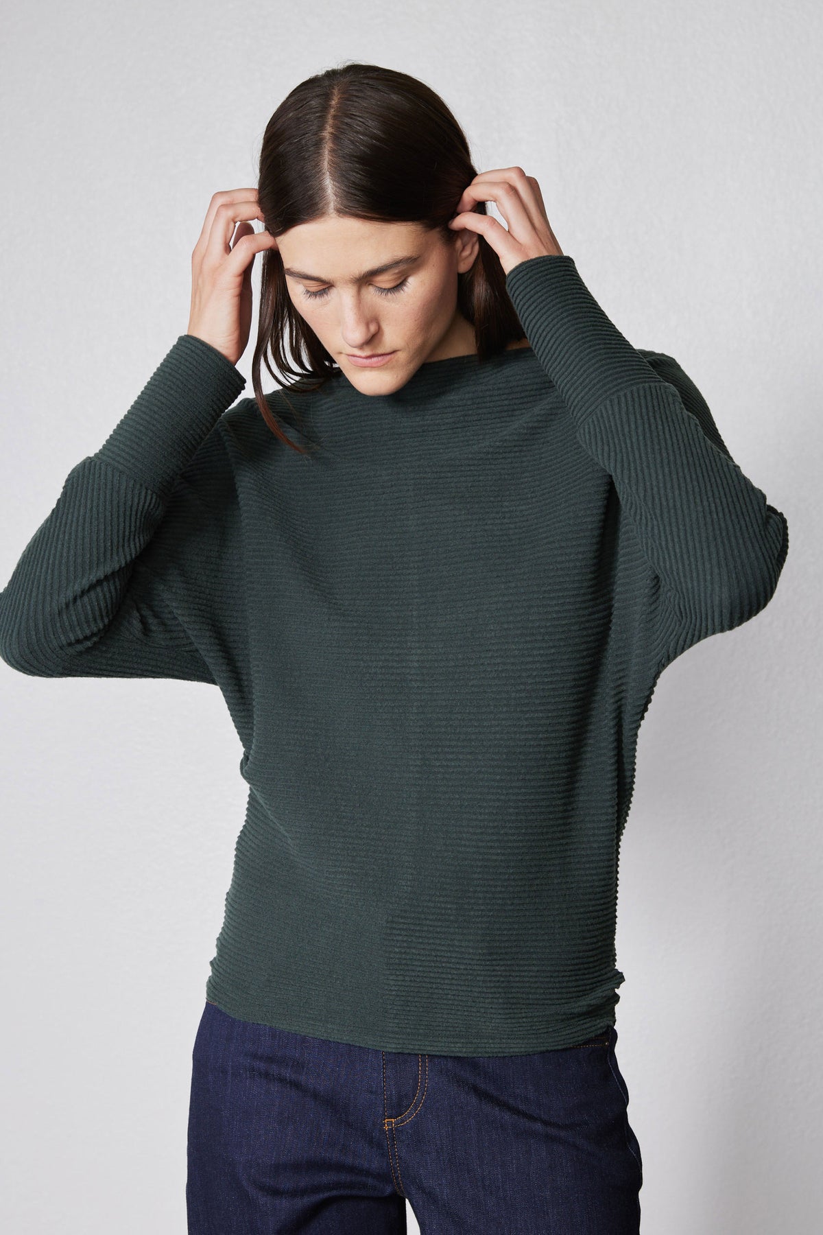 Brushed rib dolman top in dark green with crew neck and long sleeves