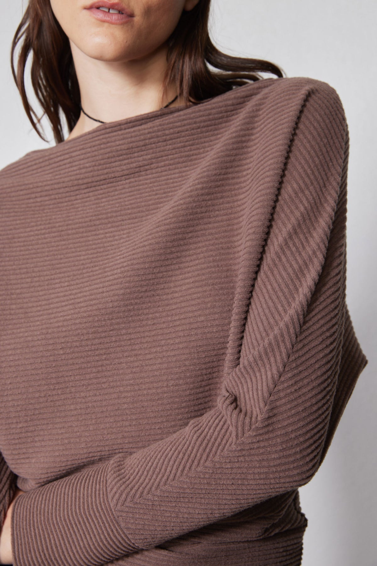 Medium taupe brushed rib dolman top close-up of shoulder and long sleeve