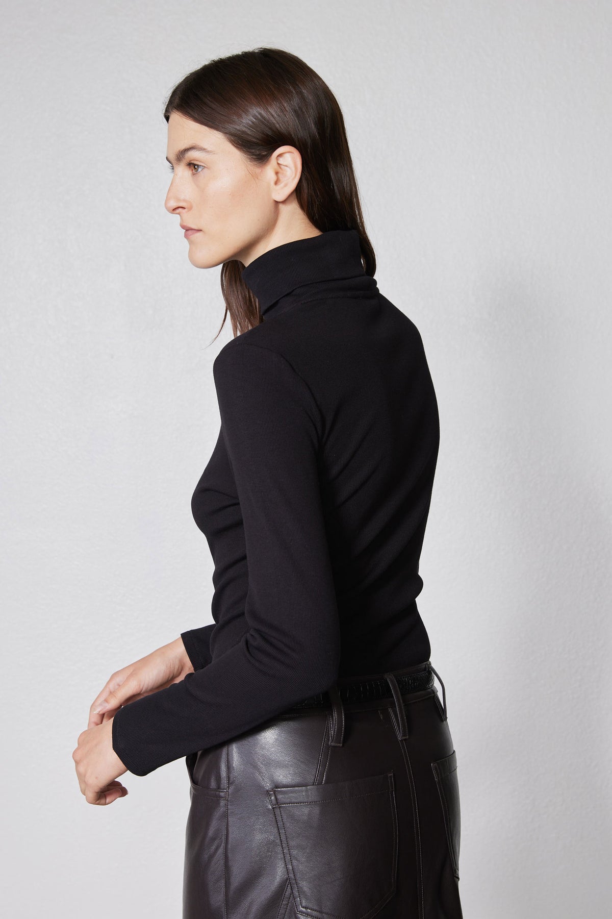 Black long-sleeve turtleneck with brushed ribbed knit and high neckline