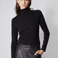Black fitted turtleneck sweater with brushed ribbed texture and high neck