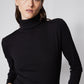 Black brushed ribbed turtleneck with high collar, long sleeves, side profile