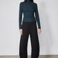 Forest green ribbed turtleneck long-sleeve top, brushed fabric, fitted waist