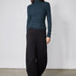 Forest green ribbed turtleneck long-sleeve top with slim fit and high collar