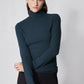 Forest green brushed ribbed turtleneck long-sleeve top, high neck and fitted body