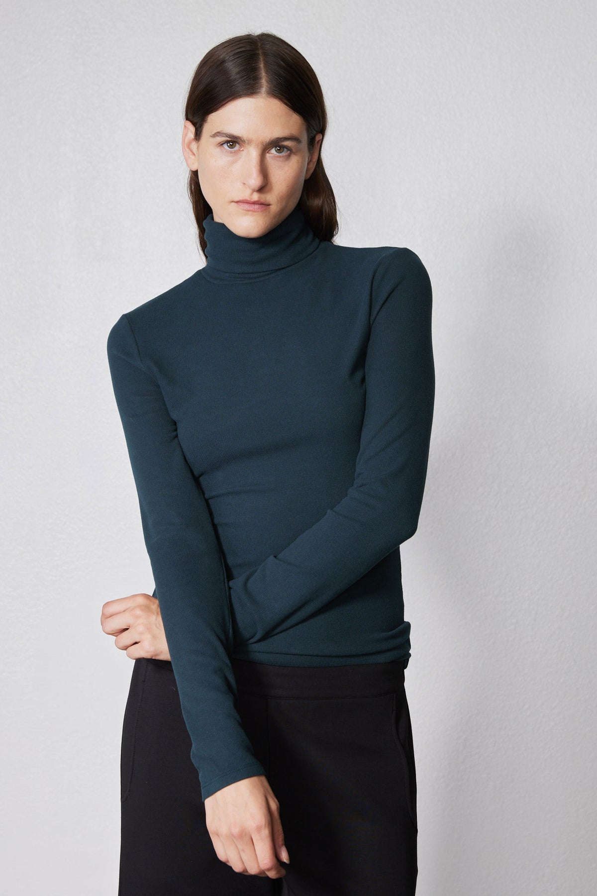Forest green brushed ribbed turtleneck long-sleeve top, high neck and fitted body