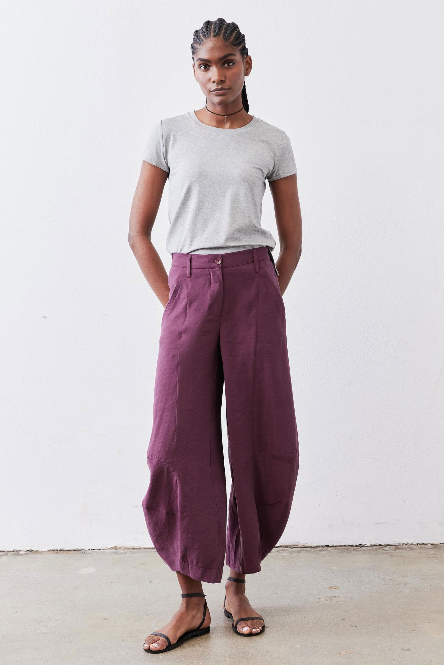 Deep purple wide-leg pants with relaxed fit and elastic waist