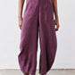 Deep purple wide-leg pants with button front and side pockets