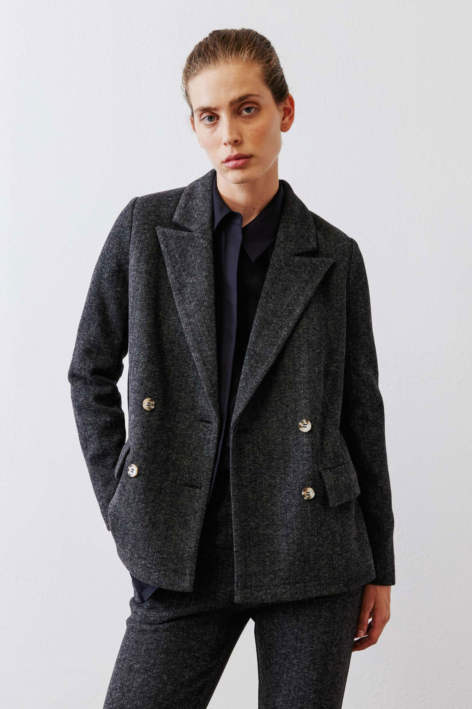 Charcoal herringbone blazer, double-breasted with gold buttons and notch lapels