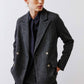 Charcoal herringbone blazer detail view, gold button closures and notch lapels