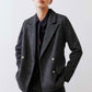 Charcoal herringbone blazer with gold buttons, notch lapels, and long sleeves
